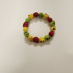 Small Red, Yellow, Green skull magnesite bead bracelet - elastic